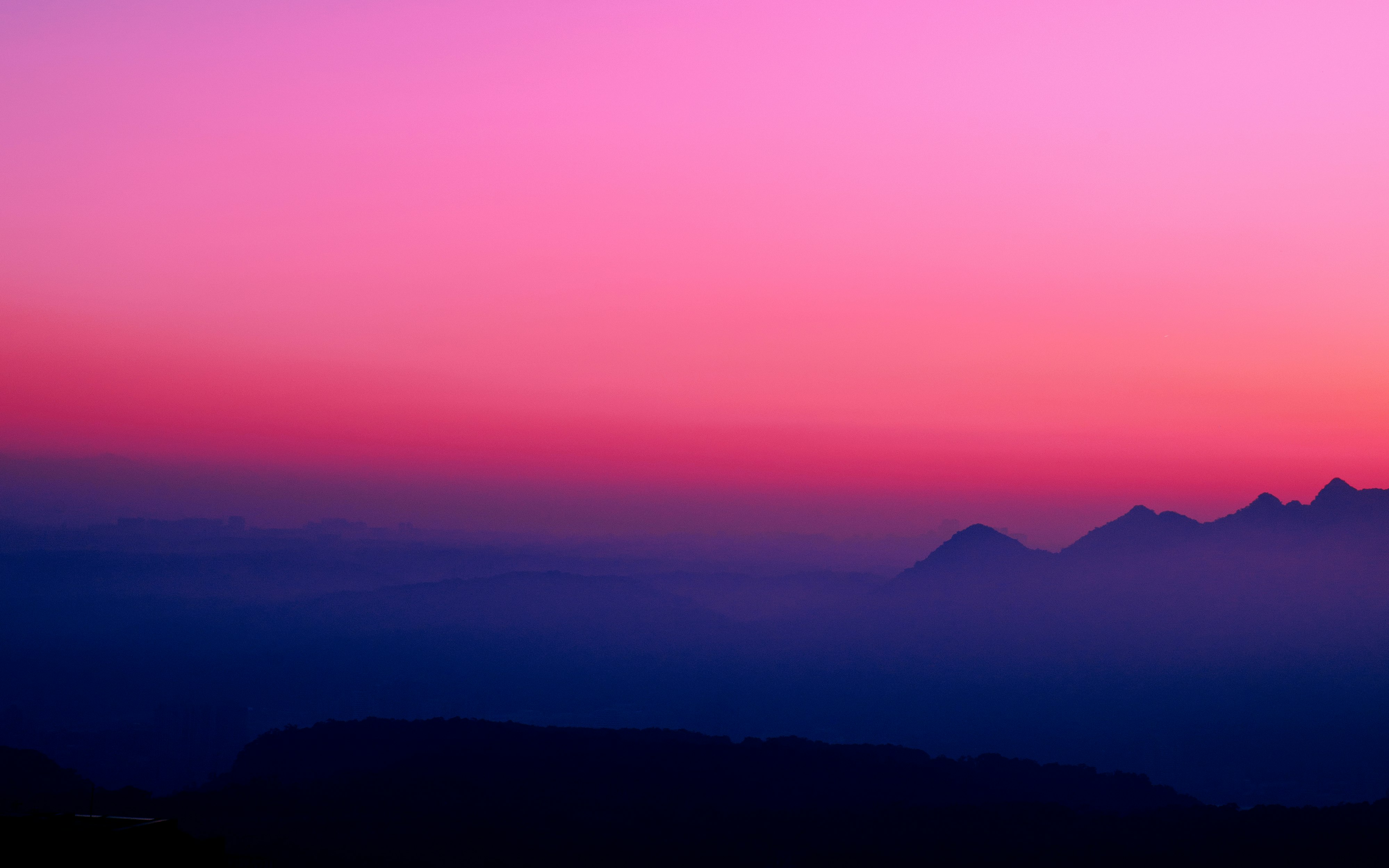 silhouette of mountains during sunset